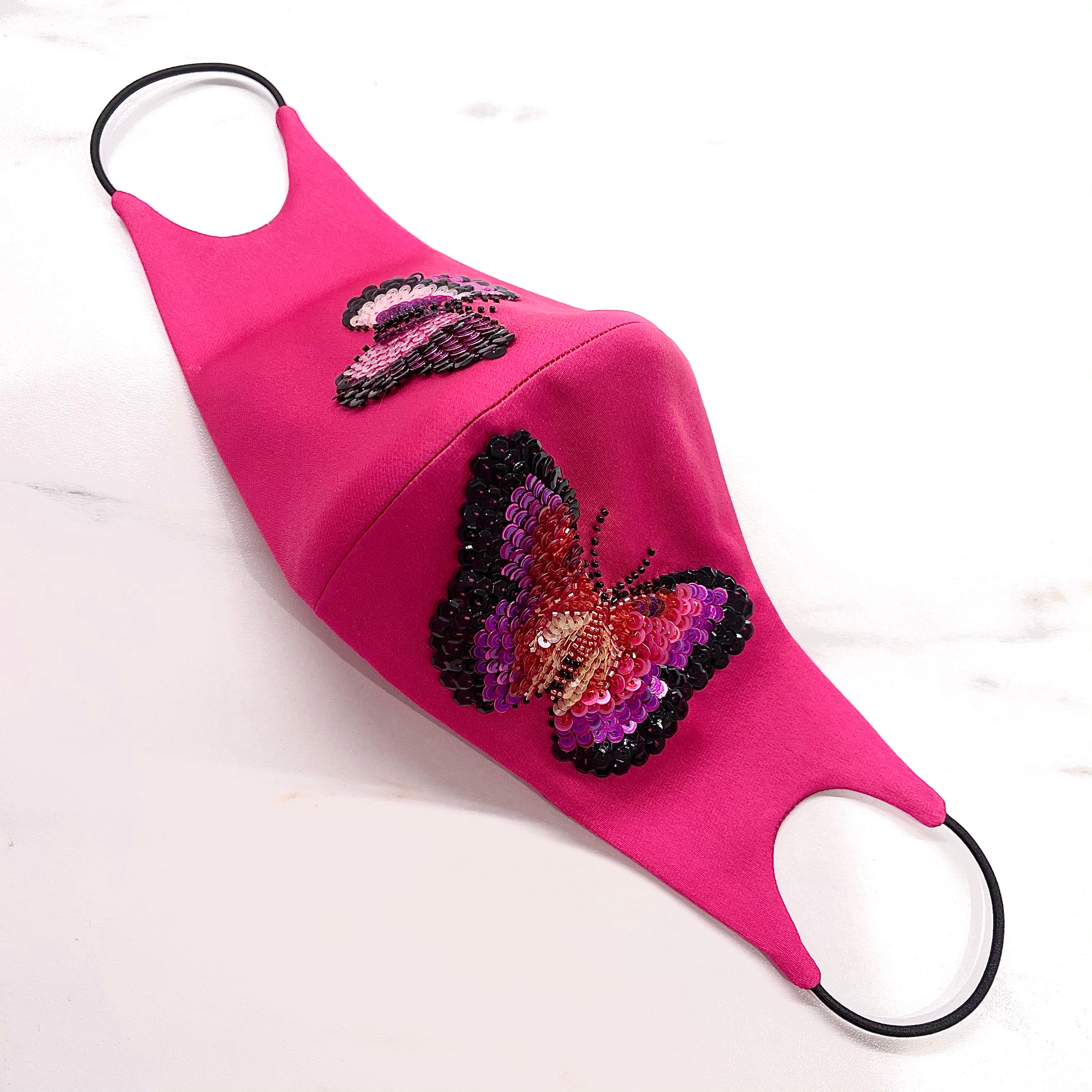 Fuchsia Papillon Mask, Mask, Anabela Chan Joaillerie - Fine jewelry with laboratory grown and created gemstones hand-crafted in the United Kingdom. Anabela Chan Joaillerie is the first fine jewellery brand in the world to champion laboratory-grown and created gemstones with high jewellery design, artisanal craftsmanship and a focus on ethical and sustainable innovations.