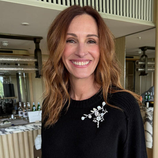 Julia Roberts wears the Fleurs D'Elixir Blossom Brooches