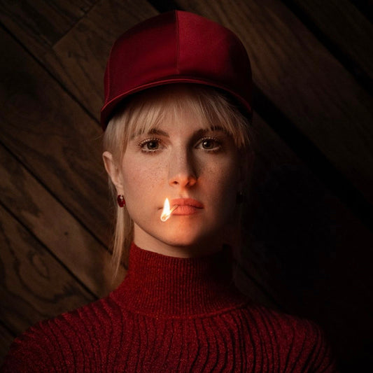 Hayley Williams wears the Ruby Cushion Wing Studs