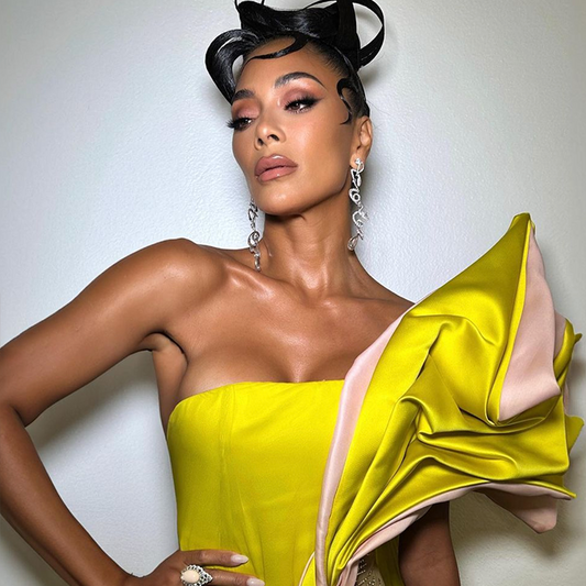 Nicole Scherzinger wears the Supernova Script Earrings