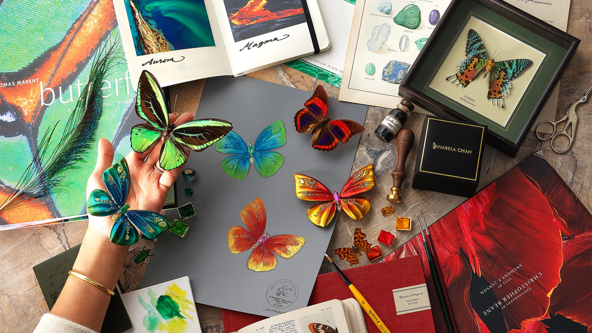 Anabela-Chan-Joaillerie_Home Page_Magma and Aurora_Aurora-Butterfly-Brooch,-Magma-Butterfly-Brooch_Still-Life-Campaign-Image_desktop