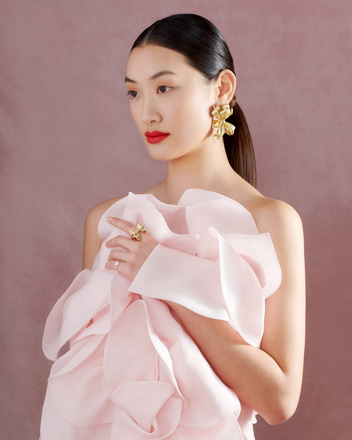 Anabela Chan Joaillerie_Champagne Antoinette Earrings, Golden Bow & Mini Diamond Heart Rings_Model Campaign Shot